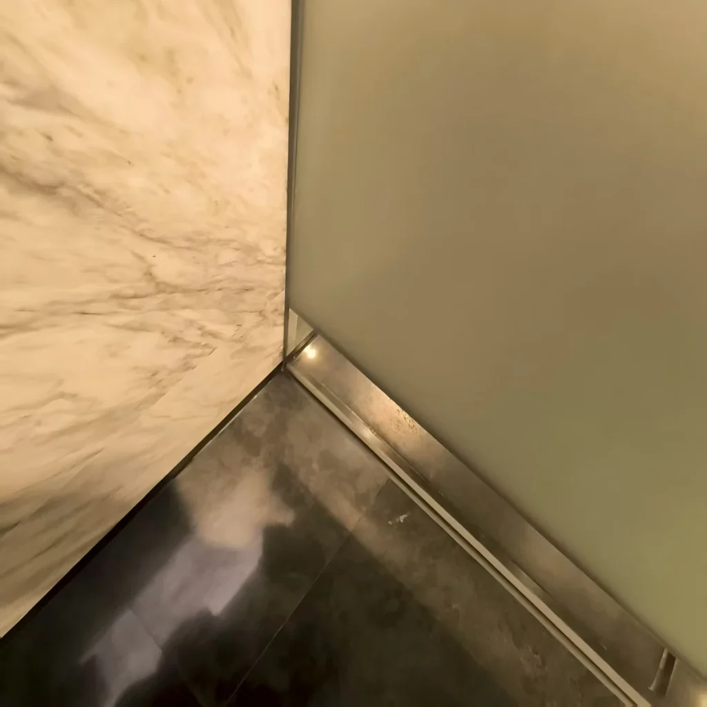 bathroom glass door bottom